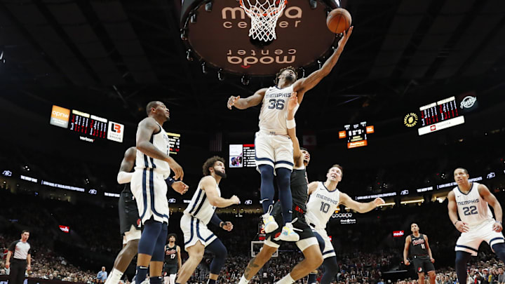 Nov 3, 2023; Portland, Oregon, USA; Memphis Grizzlies point guard Marcus Smart (36) reaches for a