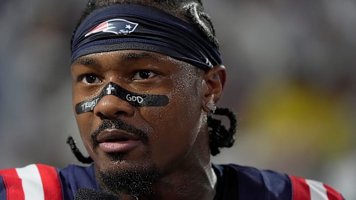 New England Patriots wide receiver Stefon Diggs talks with a sidelines reporter before the Bills home game against the New England Patriots at Highmark Stadium in Orchard Park on Oct. 5, 2025. New England Patriots wide receiver Stefon Diggs talks with a sidelines reporter before the Bills home game against the New England Patriots at Highmark Stadium in Orchard Park on Oct. 5, 2025.