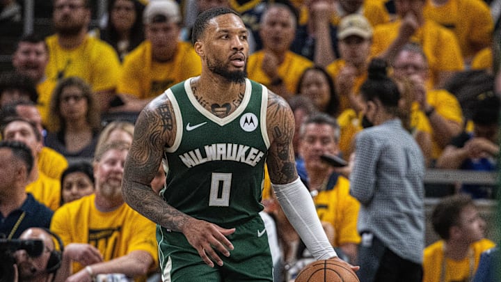 May 2, 2024; Indianapolis, Indiana, USA; Milwaukee Bucks guard Damian Lillard (0) dribbles the ball during game six of the first round for the 2024 NBA playoffs against the Indiana Pacers at Gainbridge Fieldhouse. Mandatory Credit: Trevor Ruszkowski-Imagn Images