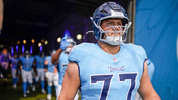 Tennessee Titans offensive tackle Peter Skoronski (77) heads out for warmups before the game against the Indianapolis Colts at Nissan Stadium in Nashville, Tenn., Sunday, Sept. 21, 2025.