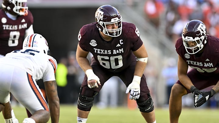 Texas A&M Aggies offensive lineman Trey Zuhn III (60) lines up during the fourth quarter against the Auburn Tigers at Kyle Field. Texas A&M Aggies offensive lineman Trey Zuhn III (60) lines up during the fourth quarter against the Auburn Tigers at Kyle Field.