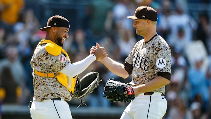 Apr 13, 2025; San Diego, California, USA; San Diego Padres starting pitcher Michael King (34) celebrates with San Diego Padres catcher Elias Diaz (17) after throwing a complete-game two hit shutout against the Colorado Rockies at Petco Park. Mandatory Credit: David Frerker-Imagn Images