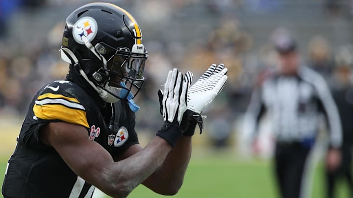 Dec 25, 2024; Pittsburgh, Pennsylvania, USA;  Pittsburgh Steelers wide receiver George Pickens (14) reacts after a Kansas City Chiefs penalty during the fourth quarter at Acrisure Stadium. Mandatory Credit: Charles LeClaire-Imagn Images