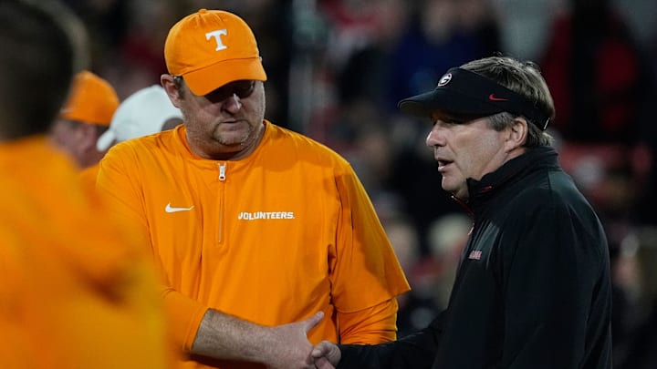 Tennessee head coach Josh Heupel shanks hands with Georgia head coach Kirby Smart before the start of a NCAA college football game against Tennessee in Athens, Ga., on Saturday, Nov. 16, 2024. Tennessee head coach Josh Heupel shanks hands with Georgia head coach Kirby Smart before the start of a NCAA college football game against Tennessee in Athens, Ga., on Saturday, Nov. 16, 2024.