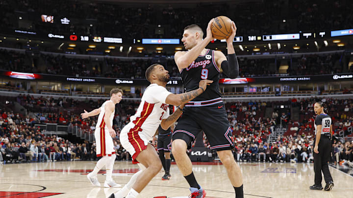 Jan 29, 2026; Chicago, Illinois, USA; Miami Heat guard Norman Powell (24) defends against Chicago Bulls center Nikola Vucevic (9) during the first half at United Center. Mandatory Credit: Kamil Krzaczynski-Imagn Images Jan 29, 2026; Chicago, Illinois, USA; Miami Heat guard Norman Powell (24) defends against Chicago Bulls center Nikola Vucevic (9) during the first half at United Center. Mandatory Credit: Kamil Krzaczynski-Imagn Images