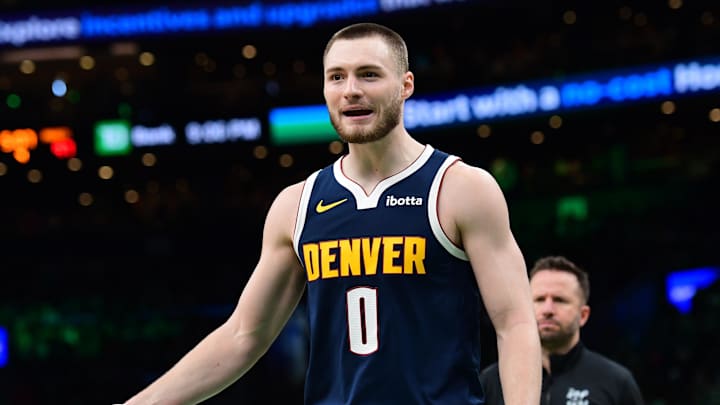 Jan 7, 2026; Boston, Massachusetts, USA; Denver Nuggets guard Christian Braun (0) reacts after a play during the second half against the Boston Celtics at TD Garden. Mandatory Credit: Bob DeChiara-Imagn Images