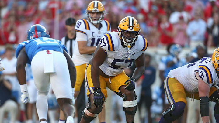 Sep 27, 2025; Oxford, Mississippi, USA; LSU Tigers offensive lineman Carius Curne (57) waits for the snap during the fourth quarter against the Mississippi Rebels at Vaught-Hemingway Stadium. Mandatory Credit: Petre Thomas-Imagn Images Sep 27, 2025; Oxford, Mississippi, USA; LSU Tigers offensive lineman Carius Curne (57) waits for the snap during the fourth quarter against the Mississippi Rebels at Vaught-Hemingway Stadium. Mandatory Credit: Petre Thomas-Imagn Images