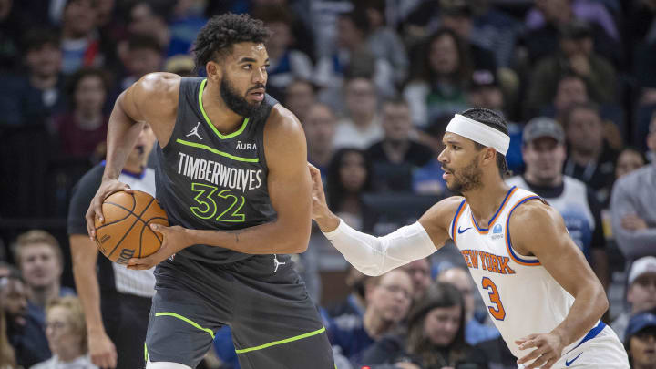 Nov 20, 2023; Minneapolis, Minnesota, USA; Minnesota Timberwolves center Karl-Anthony Towns (32) looks to pass the ball over New York Knicks guard Josh Hart (3) in the first half at Target Center. Mandatory Credit: Jesse Johnson-USA TODAY Sports Nov 20, 2023; Minneapolis, Minnesota, USA; Minnesota Timberwolves center Karl-Anthony Towns (32) looks to pass the ball over New York Knicks guard Josh Hart (3) in the first half at Target Center. Mandatory Credit: Jesse Johnson-USA TODAY Sports