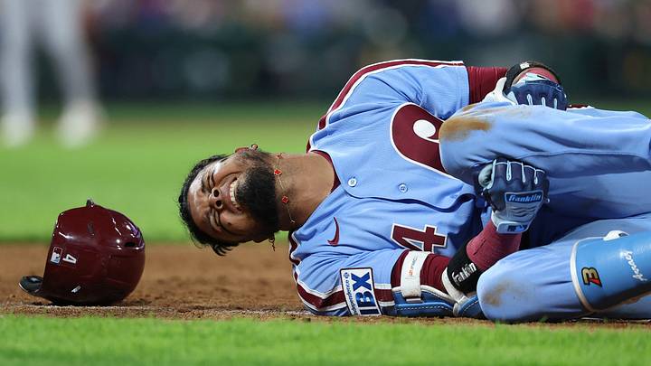 Sep 24, 2026; Philadelphia, Pennsylvania, USA; Philadelphia Phillies second baseman Luis Arraez (4) grabs his leg with an apparent injury while running to first base during the sixth inning against the Milwaukee Brewers at Citizens Bank Park. Mandatory Credit: Bill Streicher-Imagn Images Sep 24, 2026; Philadelphia, Pennsylvania, USA; Philadelphia Phillies second baseman Luis Arraez (4) grabs his leg with an apparent injury while running to first base during the sixth inning against the Milwaukee Brewers at Citizens Bank Park. Mandatory Credit: Bill Streicher-Imagn Images