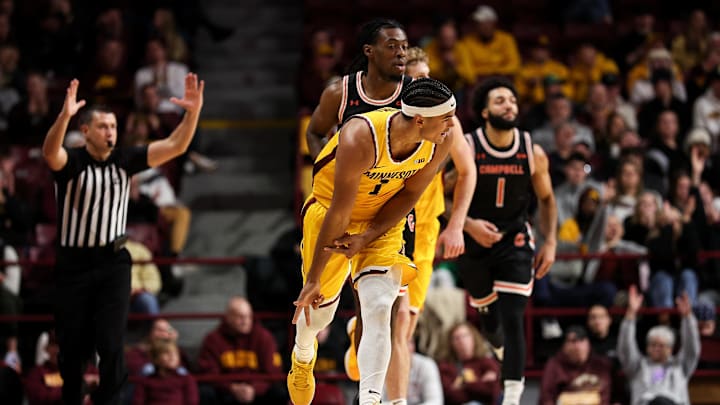 Dec 21, 2025; Minneapolis, Minnesota, USA; Minnesota Golden Gophers guard Isaac Asuma (1) celebrates his three-point basket against the Campbell Fighting Camels during the second half at Williams Arena. Mandatory Credit: Matt Krohn-Imagn Images