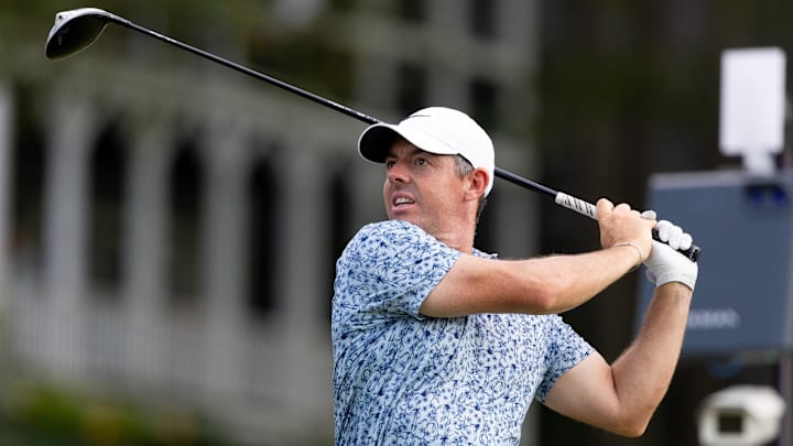 Jun 21, 2025; Cromwell, Connecticut, USA; Rory McIlroy plays his shot from the 18th tee during the third round of the Travelers Championship golf tournament. Mandatory Credit: Bill Streicher-Imagn Images