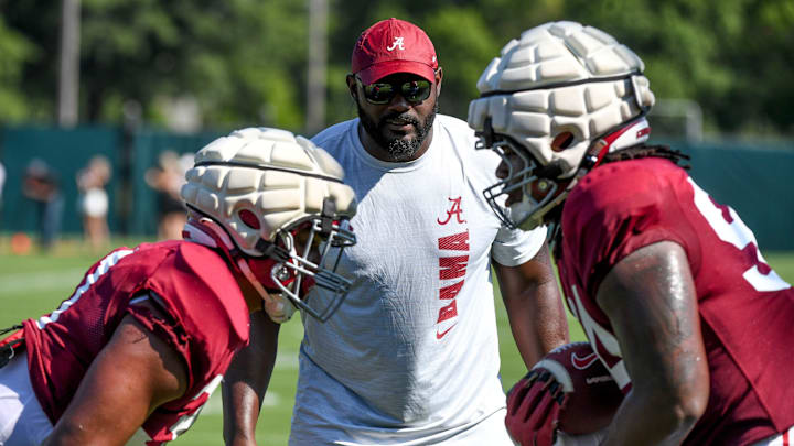The Crimson Tide players and coaches continue working toward the season opener in practice Tuesday, Aug. 13, 2024. Alabama defensive line coach Freddie Roach works his players. The Crimson Tide players and coaches continue working toward the season opener in practice Tuesday, Aug. 13, 2024. Alabama defensive line coach Freddie Roach works his players.