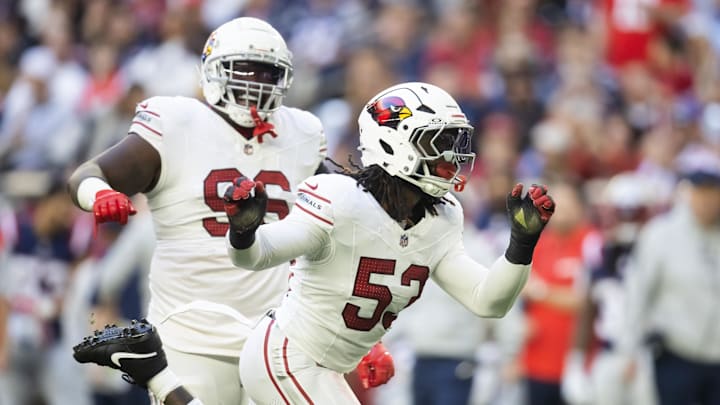 Dec 15, 2024; Glendale, Arizona, USA; Arizona Cardinals linebacker Baron Browning (53) celebrates a sack against the New England Patriots in the first half at State Farm Stadium. Mandatory Credit: Mark J. Rebilas-Imagn Images