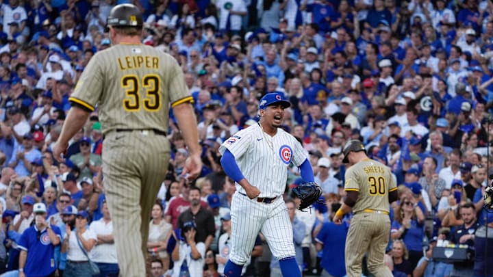 Oct 2, 2025; Chicago, Illinois, USA; Chicago Cubs relief pitcher Daniel Palencia (48) reacts after striking out San Diego Padres right fielder Fernando Tatis Jr. (23) to end the fifth inning during game three of the Wildcard round for the 2025 MLB playoffs at Wrigley Field. Mandatory Credit: David Banks-Imagn Images Oct 2, 2025; Chicago, Illinois, USA; Chicago Cubs relief pitcher Daniel Palencia (48) reacts after striking out San Diego Padres right fielder Fernando Tatis Jr. (23) to end the fifth inning during game three of the Wildcard round for the 2025 MLB playoffs at Wrigley Field. Mandatory Credit: David Banks-Imagn Images