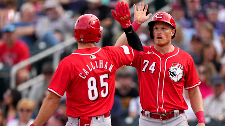 Cincinnati Reds infielder Tyler Callihan is congratulated by Cincinnati Reds outfielder Conner Capel