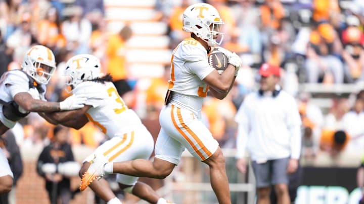 Tennessee wide receiver Tommy Winton III (30) runs with the ball during the Orange & White spring game in Neyland Stadium, Saturday, April 12, 2025.