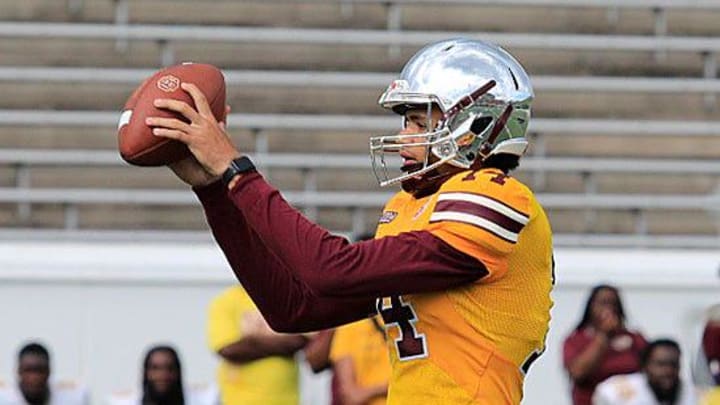 Bethune-Cookman QB Dominiq Ponder takes a snap during the Wildcats' spring game Saturday, April 22, 2023, at Daytona Stadium.

Bethune 10