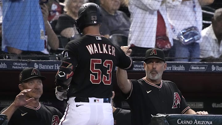 May 7, 2023; Phoenix, Arizona, USA; Arizona Diamondbacks first baseman Christian Walker (53) celebrates with manager Torey Lovullo (17) after hitting a solo home run against the Washington Nationals in the fourth inning at Chase Field.