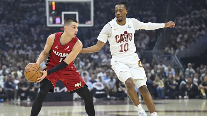 Apr 20, 2025; Cleveland, Ohio, USA; Cleveland Cavaliers guard Darius Garland (10) defends Miami Heat guard Tyler Herro (14) in the first quarter at Rocket Arena. Mandatory Credit: David Richard-Imagn Images