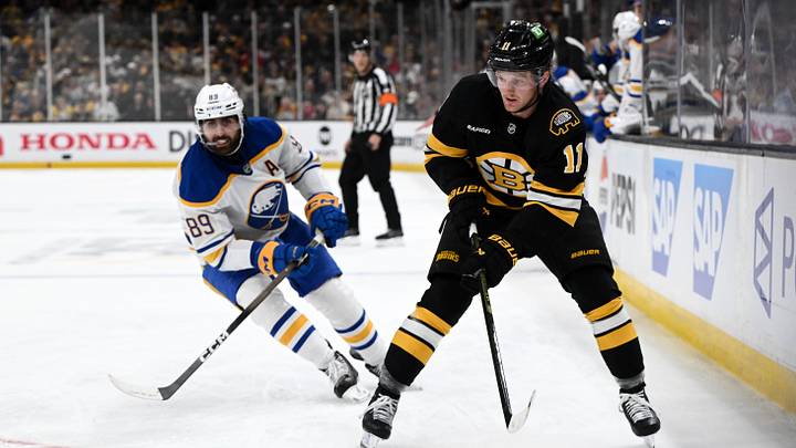 Apr 23, 2026; Boston, Massachusetts, USA; Boston Bruins center Casey Mittelstadt (11) controls the puck against Buffalo Sabres right wing Alex Tuch (89) during the third period of game three of the first round of the 2026 Stanley Cup Playoffs at the TD Garden. Mandatory Credit: Brian Fluharty-Imagn Images