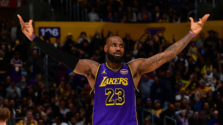 LeBron James reacts to a very long three-pointer against the Golden State Warriors.