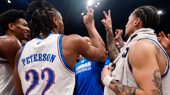 Kansas Jayhawks players huddle up after defeating Houston Cougars inside Allen Fieldhouse on Monday, Feb. 23, 2026. Kansas Jayhawks players huddle up after defeating Houston Cougars inside Allen Fieldhouse on Monday, Feb. 23, 2026.