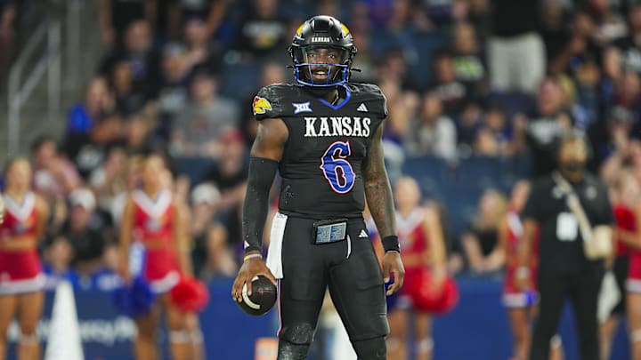 Sep 13, 2024; Kansas City, Kansas, USA; Kansas Jayhawks quarterback Jalon Daniels (6) reacts during the second half against the UNLV Rebels at Children's Mercy Park. Mandatory Credit: Jay Biggerstaff-Imagn Images
