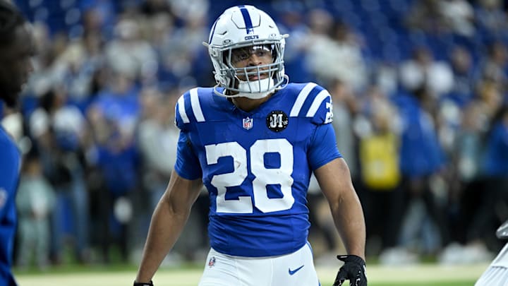 Nov 30, 2025; Indianapolis, Indiana, USA; Indianapolis Colts running back Jonathan Taylor (28) warms up before a game against the Houston Texans at Lucas Oil Stadium. 