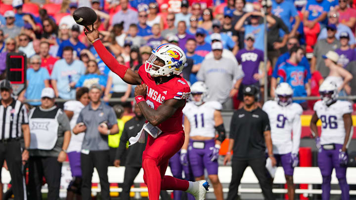 Sep 28, 2024; Kansas City, Missouri, USA; Kansas Jayhawks quarterback Jalon Daniels (6) throws a pass against the TCU Horned Frogs during the first half at GEHA Field at Arrowhead Stadium. Sep 28, 2024; Kansas City, Missouri, USA; Kansas Jayhawks quarterback Jalon Daniels (6) throws a pass against the TCU Horned Frogs during the first half at GEHA Field at Arrowhead Stadium.