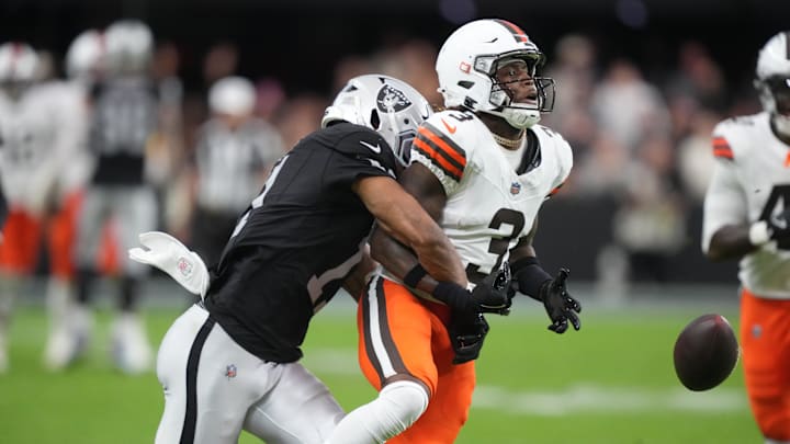 Las Vegas Raiders safety Jeremy Chinn strips Cleveland Browns receiver Jerry Jeudy from behind after a long gain.