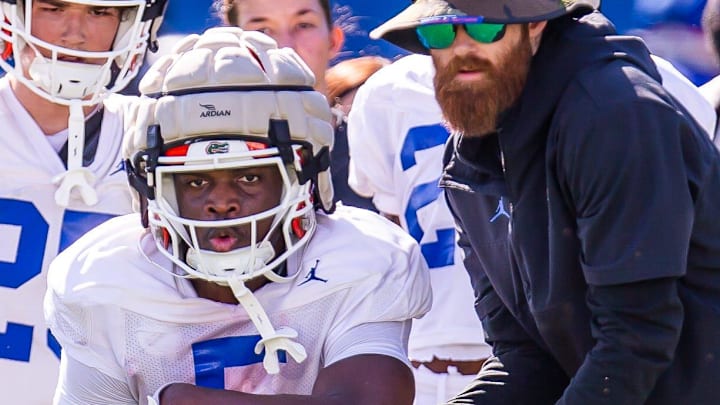 Florida Gators running back Treyaun Webb (5) takes a hand off while running a drill during University of Florida Gators’ Spring football practice at Sanders Practice Fields in Gainesville, FL on Thursday, March 28, 2024. [Doug Engle/Gainesville Sun]