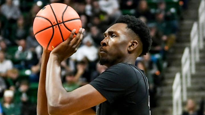 Michigan State's Xavier Booker makes a 3-pointer against Stony Brook during the second half on