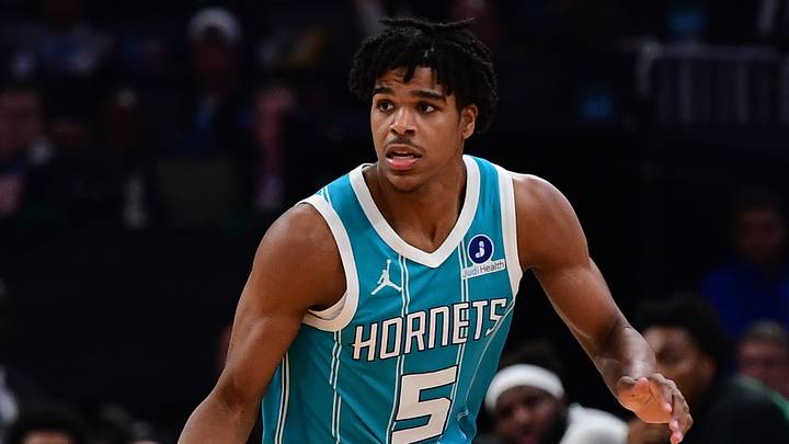 Oct 14, 2026; Boston, Massachusetts, USA;  Charlotte Hornets guard Christian Anderson (5) controls the ball during the second half against the Boston Celtics at TD Garden. Mandatory Credit: Bob DeChiara-Imagn Images