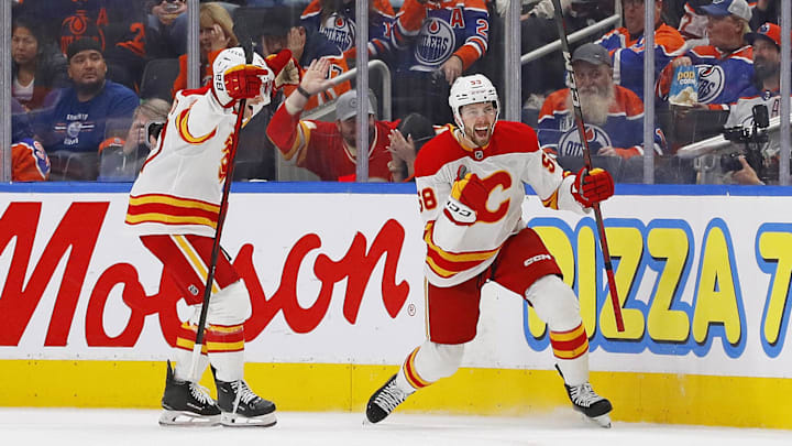 Oct 13, 2024; Edmonton, Alberta, CAN; The Calgary Flames celebrate a goal scored by forward Justin Kirkland (58) during the third period against the Edmonton Oilers at Rogers Place. Mandatory Credit: Perry Nelson-Imagn Images Oct 13, 2024; Edmonton, Alberta, CAN; The Calgary Flames celebrate a goal scored by forward Justin Kirkland (58) during the third period against the Edmonton Oilers at Rogers Place. Mandatory Credit: Perry Nelson-Imagn Images