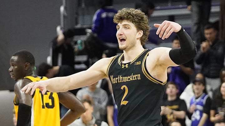 Feb 28, 2025; Evanston, Illinois, USA; Northwestern Wildcats forward Nick Martinelli (2) celebrates a win against the Iowa Hawkeyes at Welsh-Ryan Arena. Mandatory Credit: David Banks-Imagn Images