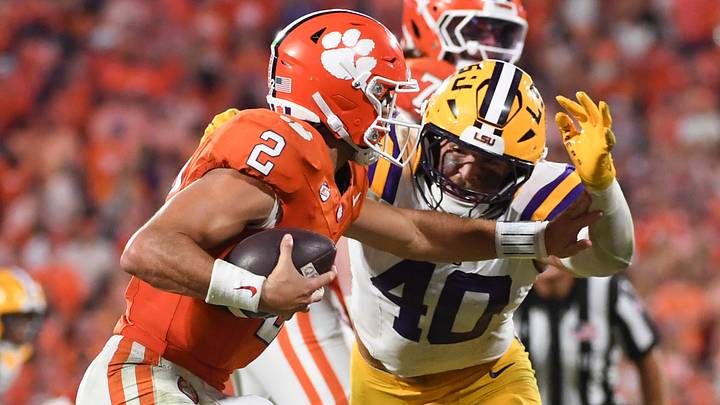 LSU Tigers linebacker Whit Weeks (40) pressures Clemson Tigers quarterback Cade Klubnik (2) Saturday, Aug. 30, 2025 during the NCAA football game at Memorial Stadium in Clemson, South Carolina. LSU Tigers won 17-10.