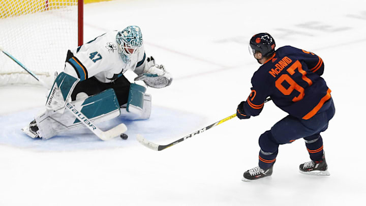 Apr 28, 2022; Edmonton, Alberta, CAN; San Jose Sharks goaltender James Reimer (47) makes a save on Connor McDavid (97)