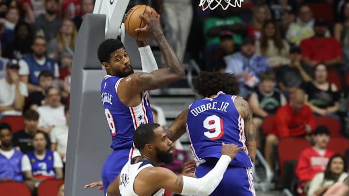 Oct 11, 2024; Des Moines, Iowa, USA; Philadelphia 76ers forward Paul George (8) grabs a rebound in their game with the Minnesota Timberwolves at Wells Fargo Arena. Mandatory Credit: Reese Strickland-Imagn Images Oct 11, 2024; Des Moines, Iowa, USA; Philadelphia 76ers forward Paul George (8) grabs a rebound in their game with the Minnesota Timberwolves at Wells Fargo Arena. Mandatory Credit: Reese Strickland-Imagn Images