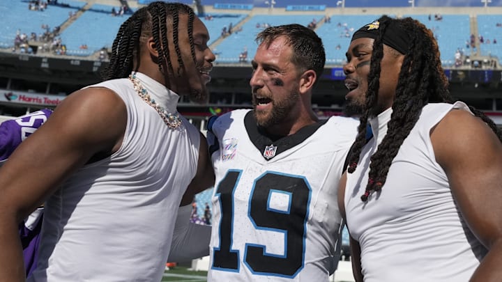 Oct 1, 2023; Charlotte, North Carolina, USA; Minnesota Vikings wide receiver Justin Jefferson (18) (left) and Carolina Panthers wide receiver Adam Thielen (19) and Minnesota Vikings wide receiver K.J. Osborn (17) (right) after the game at Bank of America Stadium.