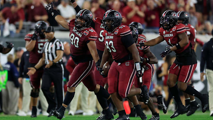 South Carolina Gamecocks defensive lineman T.J. Sanders (90) celebrates defensive lineman Nick Barrett (93) after Barrett picked up a fumble turnover during the third quarter of the TaxSlayer Gator Bowl of an NCAA college football game Friday, Dec. 30, 2022 at TIAA Bank Field in Jacksonville. The Notre Dame Fighting Irish held off the South Carolina Gamecocks 45-38. [Corey Perrine/Florida Times-Union]

Jki 123022 Ncaaf Nd Usc Cp 98