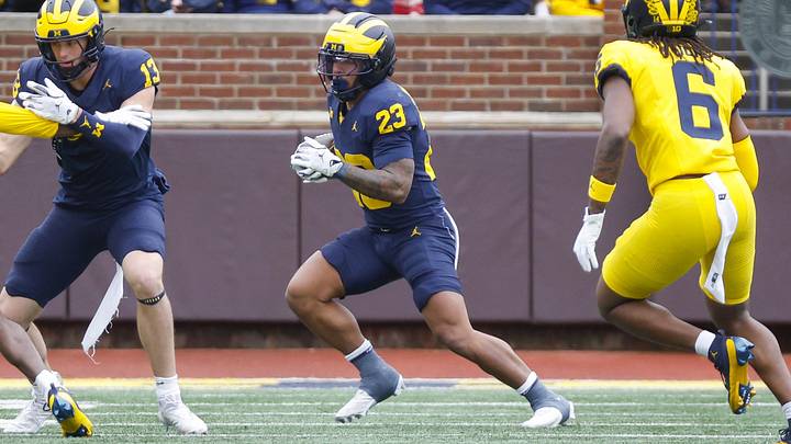 Michigan Wolverines running back Jordan Marshall runs the ball during the spring game