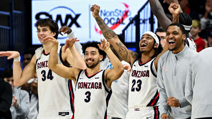 Gonzaga Bulldogs Braden Huff (34), Braeden Smith (3), Adam Miller (23) and assistant coach Zach Norvell Jr. 