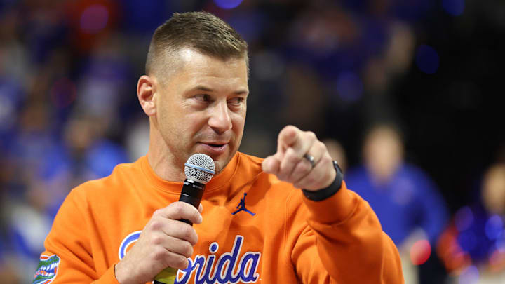 New Gator head football coach Jon Sumrall fires up the crowd during the first half an NCAA basketball game at Steven C. O'Connell Center Exactek arena in Gainesville, FL on Saturday, January 24, 2026. Students, who get in free, have a limited number of seats so many camp out overnight. [Alan Youngblood/Gainesville Sun]