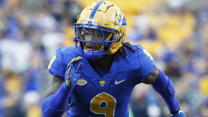 Oct 12, 2024; Pittsburgh, Pennsylvania, USA;  Pittsburgh Panthers defensive back Kyle Louis (9) pass rushes at he line of scrimmage against the California Golden Bears during the third quarter at Acrisure Stadium. Mandatory Credit: Charles LeClaire-Imagn Images