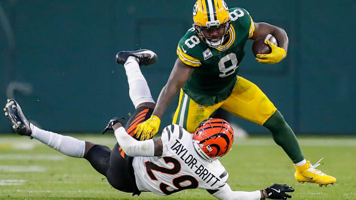 Green Bay Packers running back Josh Jacobs (8) stiff-arms Cincinnati Bengals cornerback Cam Taylor-Britt (29) on Sunday, October 12, 2025, at Lambeau Field in Green Bay, Wis. The Packers won the game, 27-18.
Tork Mason/USA TODAY NETWORK-Wisconsin