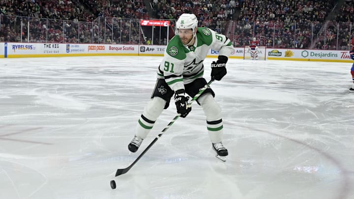 Feb 10, 2024; Montreal, Quebec, CAN; Dallas Stars forward Tyler Seguin (91) controls the puck