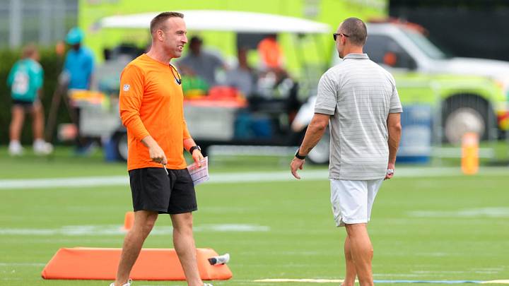 Miami Dolphins head coach Jeff Hafley (left) speaks to general manager Jon-Eric Sullivan during practice at the Baptist Health Training Complex. Miami Dolphins head coach Jeff Hafley (left) speaks to general manager Jon-Eric Sullivan during practice at the Baptist Health Training Complex.