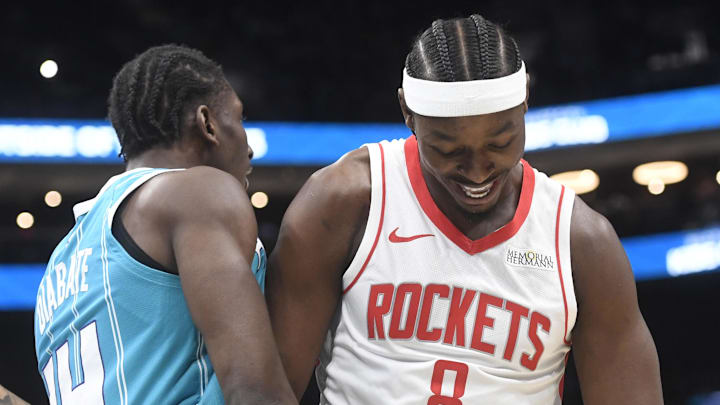 Dec 23, 2024; Charlotte, North Carolina, USA; Charlotte Hornets forward Moussa Diabate (14) and Houston Rockets forward Jae’Sean Tate (8) bump after some aggressive play during the first half at the Spectrum Center. Mandatory Credit: Sam Sharpe-Imagn Images Dec 23, 2024; Charlotte, North Carolina, USA; Charlotte Hornets forward Moussa Diabate (14) and Houston Rockets forward Jae’Sean Tate (8) bump after some aggressive play during the first half at the Spectrum Center. Mandatory Credit: Sam Sharpe-Imagn Images