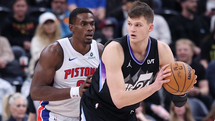 Mar 3, 2025; Salt Lake City, Utah, USA; Utah Jazz center Walker Kessler (24) posts up against Detroit Pistons center Jalen Duren (0) during the first half at Delta Center. Mar 3, 2025; Salt Lake City, Utah, USA; Utah Jazz center Walker Kessler (24) posts up against Detroit Pistons center Jalen Duren (0) during the first half at Delta Center.