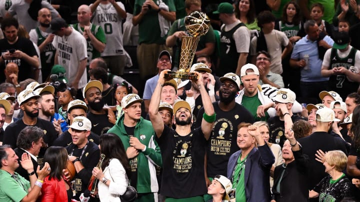 Jun 17, 2024; Boston, Massachusetts, USA; Boston Celtics forward Jayson Tatum (0) holds up the Larry O'Brien Championship Trophy after the Celtics beat the Dallas Mavericks in game five of the 2024 NBA Finals at the TD Garden. Mandatory Credit: Brian Fluharty-USA TODAY Sports Jun 17, 2024; Boston, Massachusetts, USA; Boston Celtics forward Jayson Tatum (0) holds up the Larry O'Brien Championship Trophy after the Celtics beat the Dallas Mavericks in game five of the 2024 NBA Finals at the TD Garden. Mandatory Credit: Brian Fluharty-USA TODAY Sports